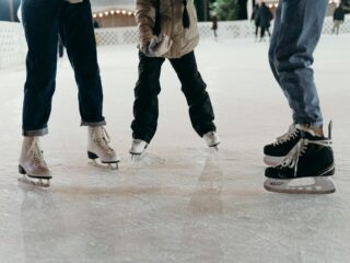 people ice skating together
